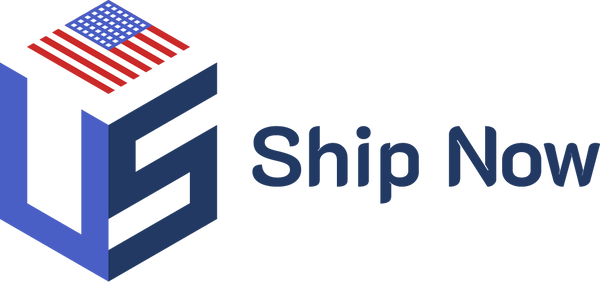 The US Ship Now long form logo - a 3d cube shape with the letters "U" and "S" making up the sides and an american flag design on top. To the right of the cube shape is the phrase "Ship Now"